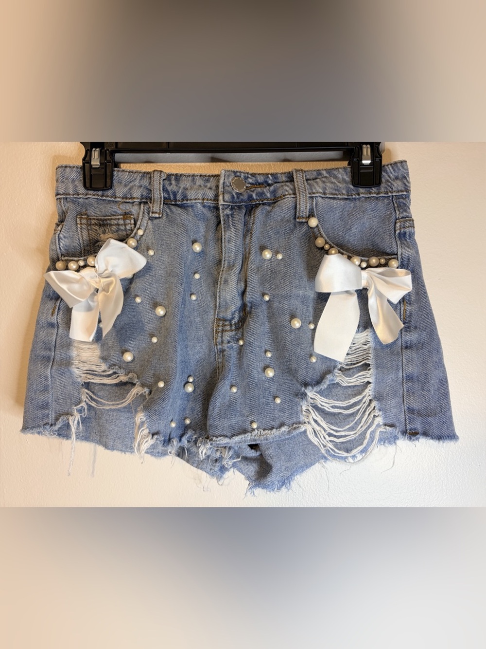 Distressed Pearl Bow Jean Shorts